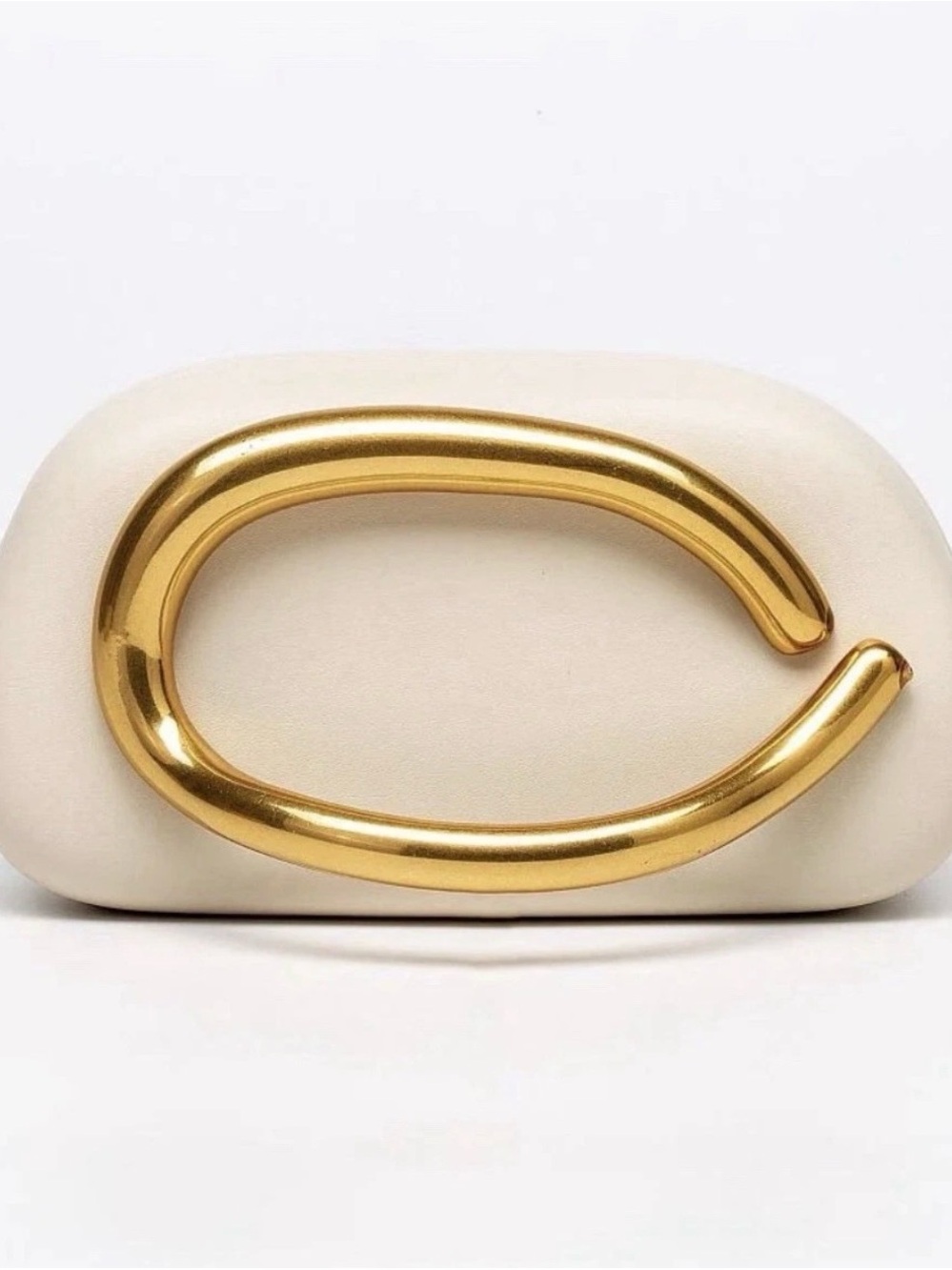 Elegant Cream Clutch with Statement Gold Handle